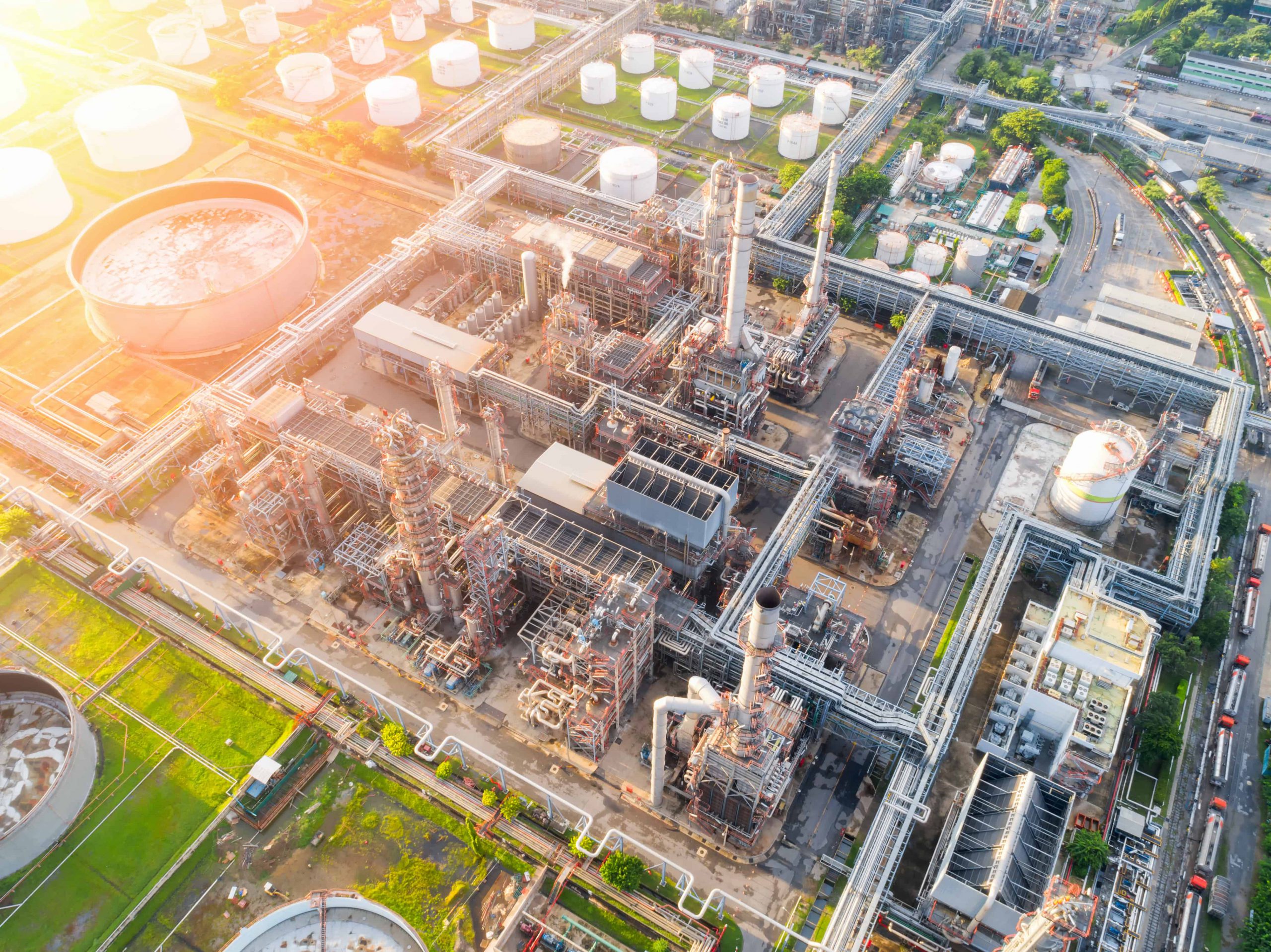 Aerial view of twilight of oil refinery ,Shot from drone of Oil refinery and Petrochemical plant at dusk , Bangkok, Thailand