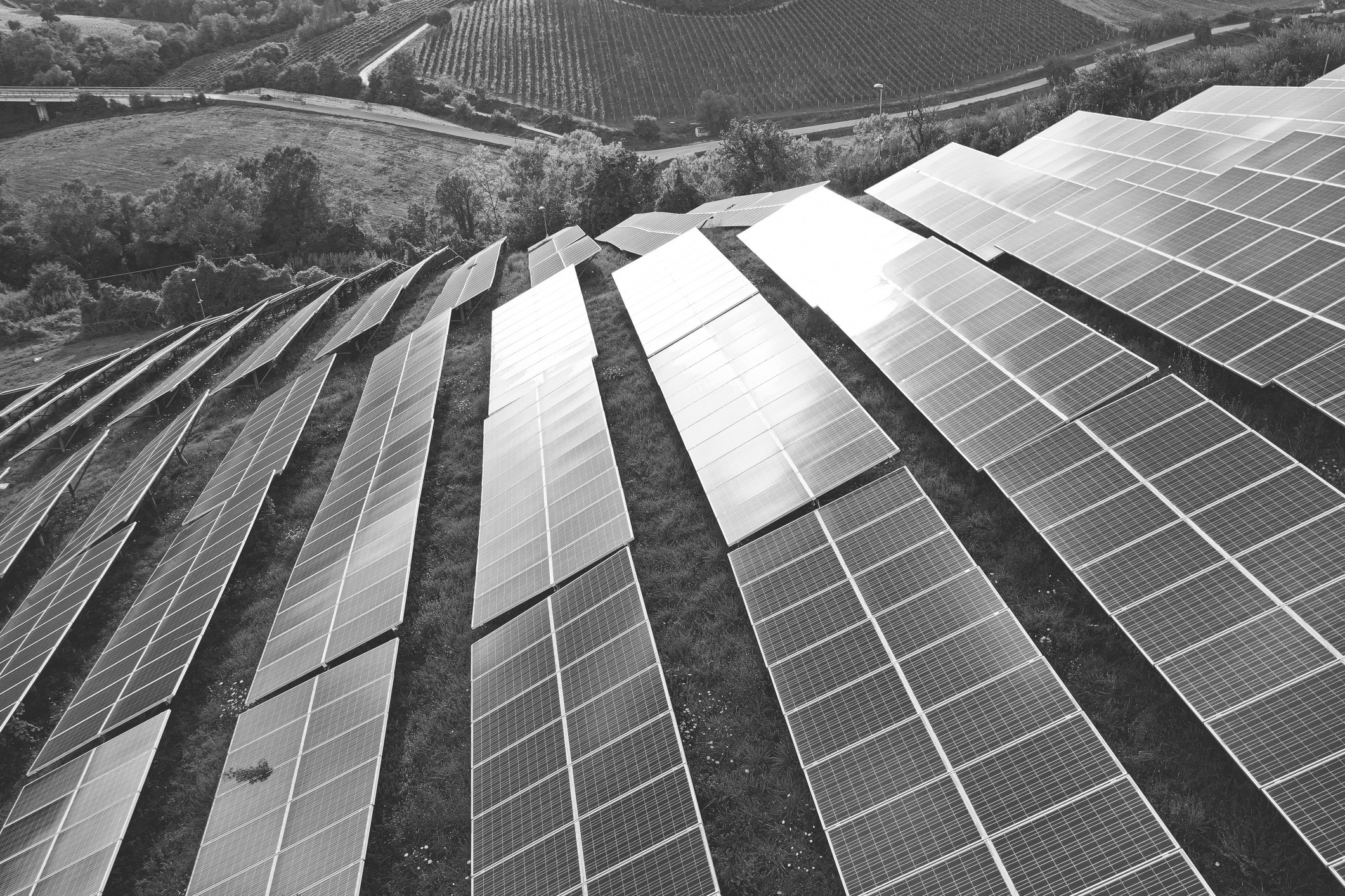 Solar panels fields on the green hills